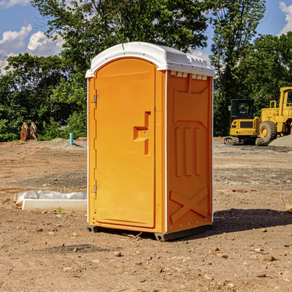 what is the cost difference between standard and deluxe portable toilet rentals in Romney IN